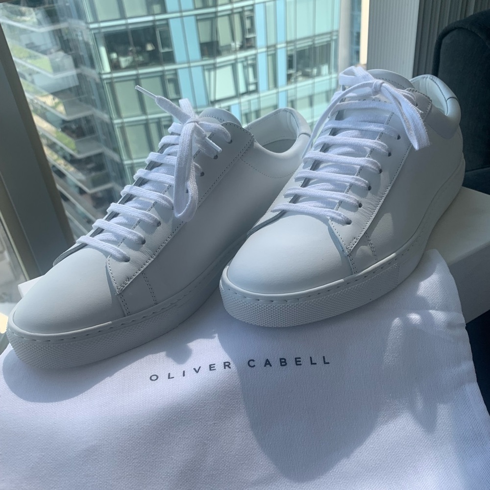 Brand new, never worn white sneakers from italy